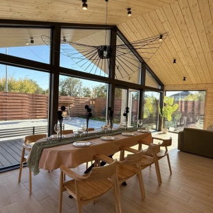 Фотография Коттеджа Шале Дом Barnhouse с баней и банным чаном на территории