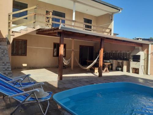 Фотографии гостевого дома
Sobrado com piscina em Caioba