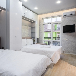 Фотография квартиры Апартаменты RED APARTMENTS Арт Лайт Сити апартамент Бенуа