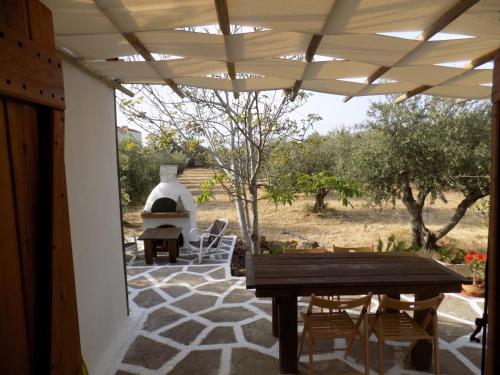 Фотография гостевого дома To Mikro Spiti sto Livadi