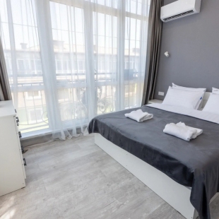 Фотография квартиры Апартаменты Red Apartments Арт Лайт Сити Грант