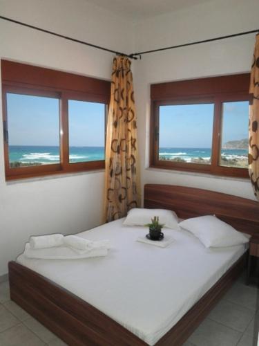 Фотография гостевого дома En Plo Beachfront Rooms