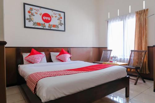 Фотографии гостиницы 
            OYO 1028 Garuda Residence