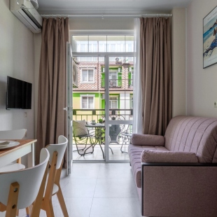 Фотография квартиры Апартаменты RED APARTMENTS Арт Лайт Сити апартамент Мартел