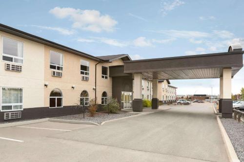 Фотография гостиницы Days Inn & Suites by Wyndham Thompson