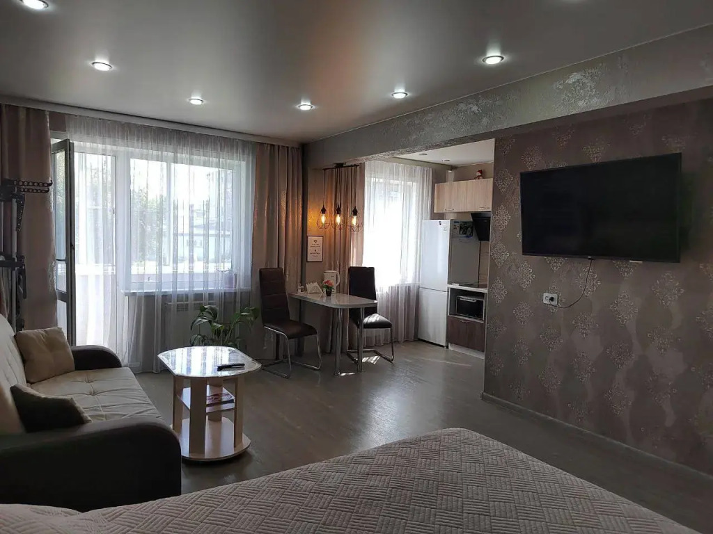 Фотография квартиры Квартира Чистая и уютная студия Люкс в центре города для отдыха и времяпровождения