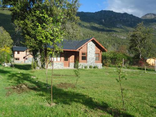 Фотографии гостевого дома 
            Cabañas Peñi Huen