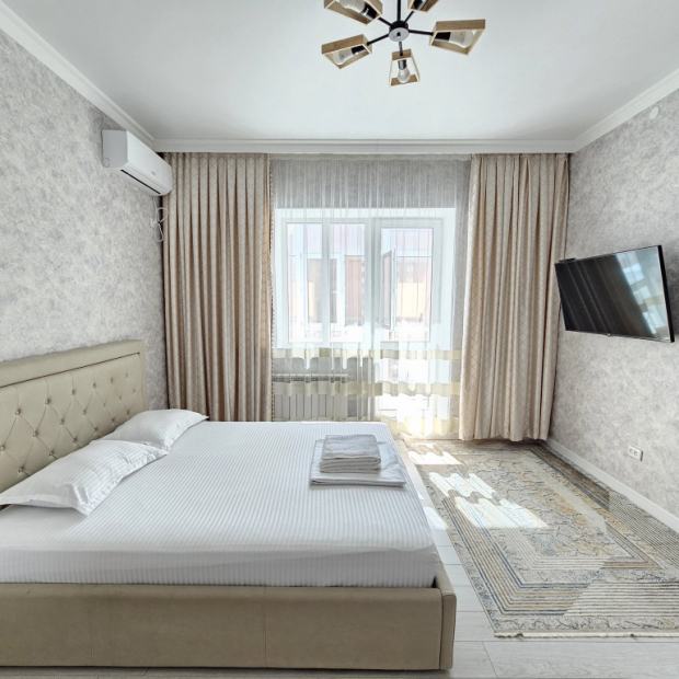 Фотографии квартиры 
            Апартаменты MARS APARTMENTS KZ 2A