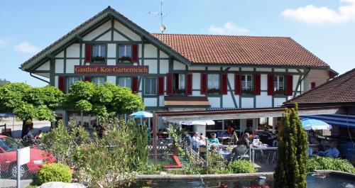 Фотография гостиницы Hotel Restaurant Koi-Gartenteich