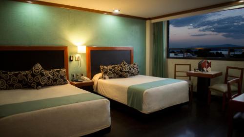 Фотография гостиницы Hotel Abastos Plaza