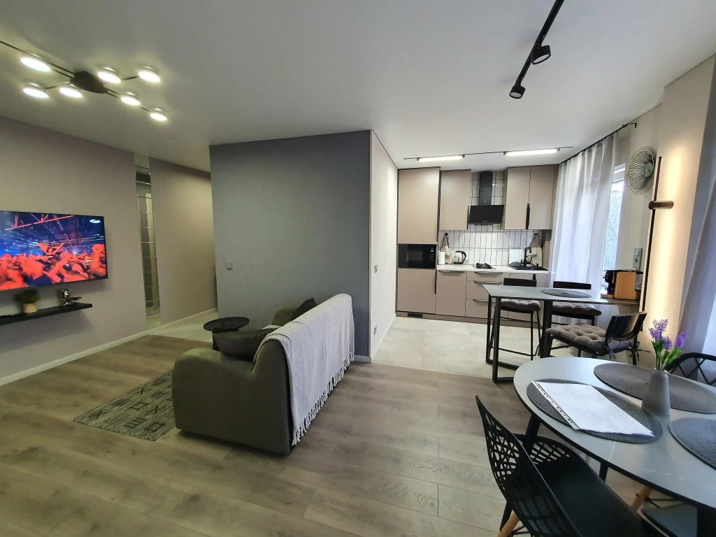 Фотография квартиры Апартаменты Три семерки на улице Гостиная