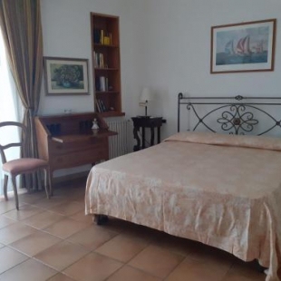 Фотография гостевого дома VelaLatina Residence B&B Soverato - Camera Scirocco