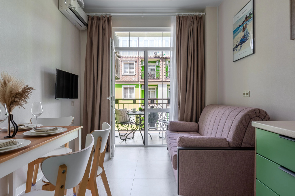 Фотография квартиры Апартаменты RED APARTMENTS Арт Лайт Сити апартамент Мартел