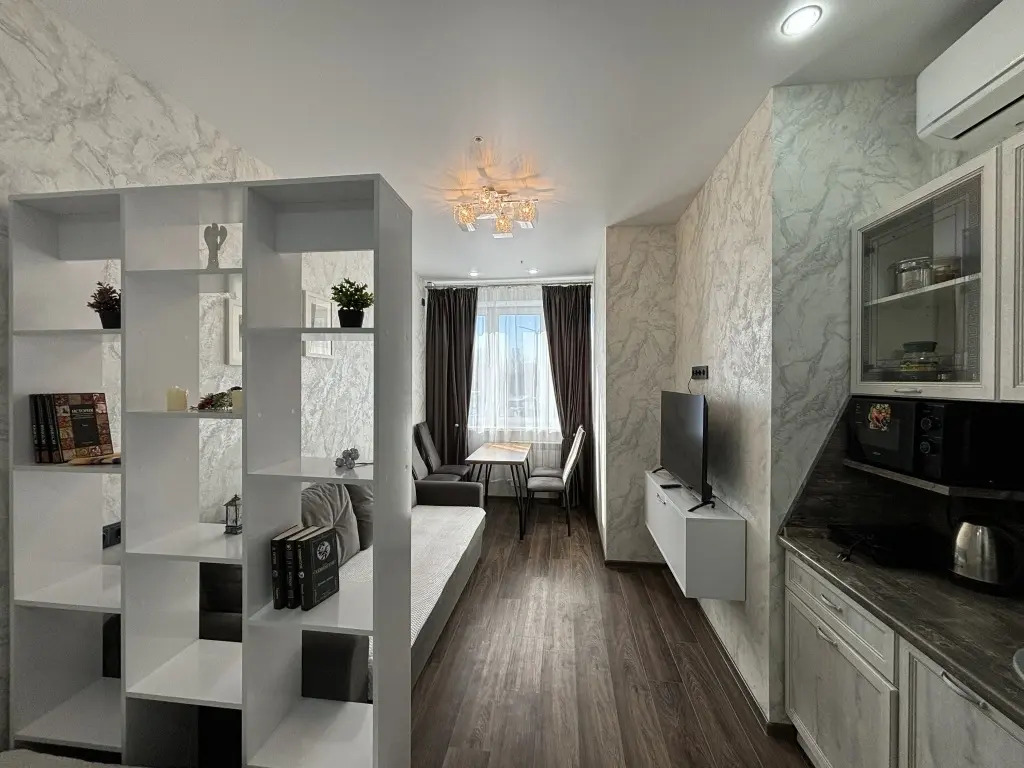 Фотография квартиры Атмосферная студия с большими окнами с комфортом разместит от двух человек, до 4-х человек от Уют и Комфорт НН