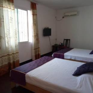 Фотографии гостиницы 
            Shell Haikou Xiuying District Hainan University Hotel