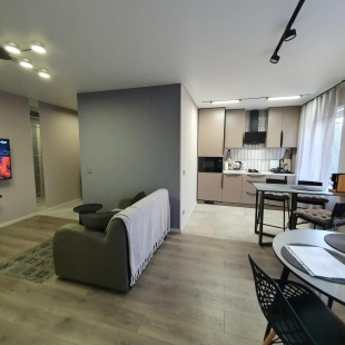 Фотография квартиры Апартаменты Три семерки на улице Гостиная