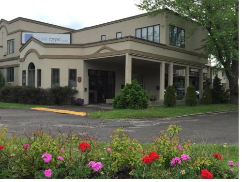 Фотография мотеля Motel Capri et Suites