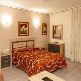 Фотографии гостевого дома 
            Hostal El Cruce