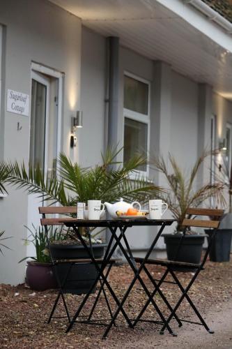 Фотография гостевого дома Pen-Y-Worlod Cottages