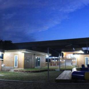 Фотографии гостевого дома 
            Tobang Red Clay Pension