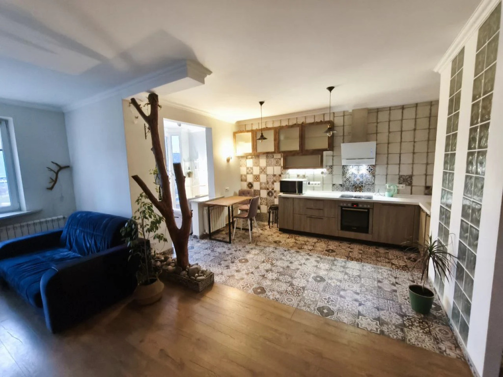 Фотография квартиры Апартаменты Студия с камином, деревом и видом на реку