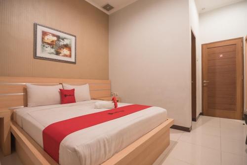 Фотография гостевого дома RedDoorz @ Sersan Bajuri Atas