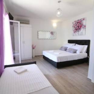 Фотографии гостевого дома 
            Apartmani Daša Tučepi