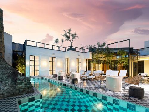 Фотография гостиницы L'Ôtel at Dôce18 Concept House