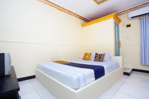 Фотография гостиницы SPOT ON 2473 Buana Jaya Guest House
