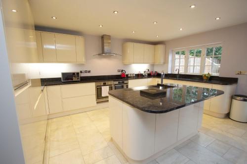 Фотография гостевого дома Coach House