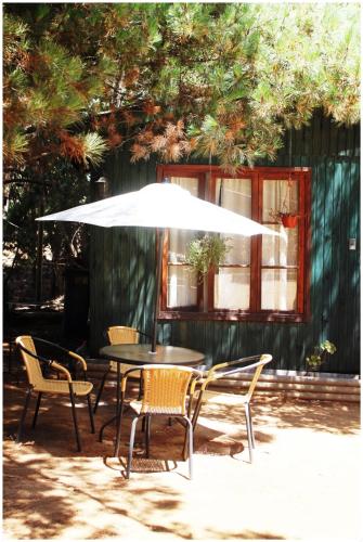 Фотография гостевого дома Cabañas La Magia de Isla Negra