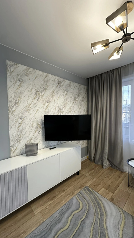 Фотография квартиры Квартира Просторная однокомнатная квартира - студия в центре города, тихий район