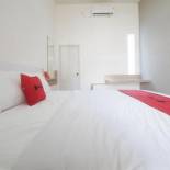 Фотография гостевого дома RedDoorz Syariah near Mutiara SIS Al Jufrie Airport Palu 2