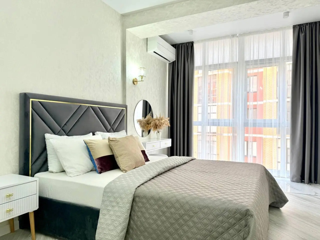 Фотография квартиры Апартаменты Современная студия с панорамными окнами и видом на озеро