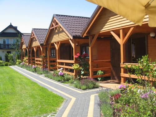 Фотография гостевого дома Domki w Ogrodzie