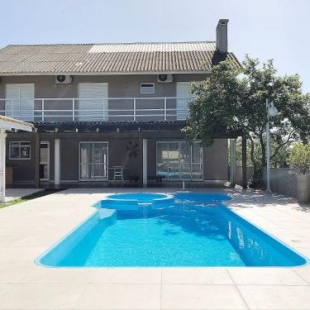 Фотография гостевого дома Maravilhosa residência em condomínio fechado Condomínio Solar das Marinas