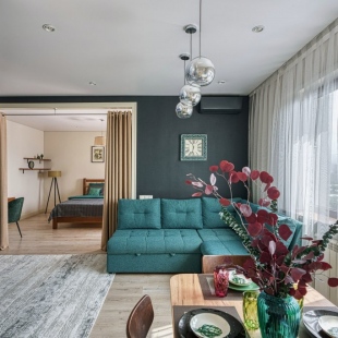 Фотография квартиры Современные апартаменты с видом на город и горы.