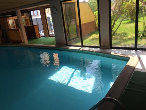 Фотография гостевого дома Grande Chambre climatisée chez Xavier