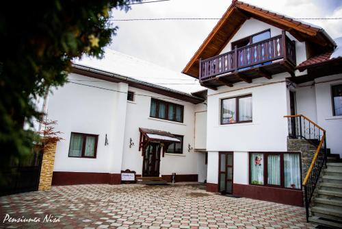 Фотография гостевого дома Pensiunea Nisa