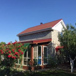 Фотография гостевого дома Уютный дом на берегу моря