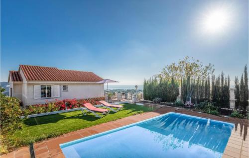 Фотографии гостевого дома 
            Awesome home in Sant Cebrià de Vallalt w/ Outdoor swimming pool and 5 Bedrooms