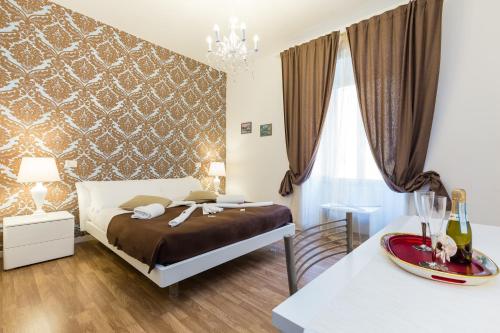 Фотография гостевого дома Rione Monti Suites