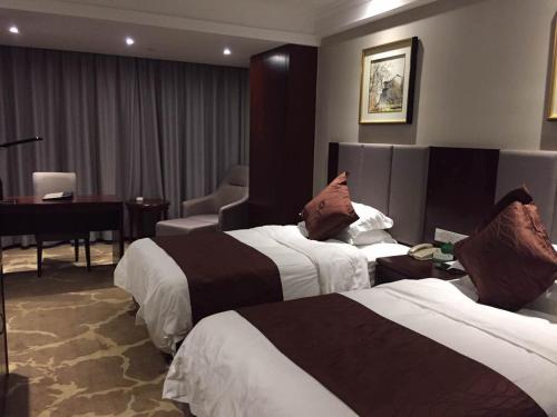 Фотография гостиницы Huzhou Wealth Hotel