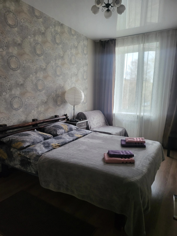 Фотография квартиры Апартаменты Суточно RentDay на улице Карла Маркса