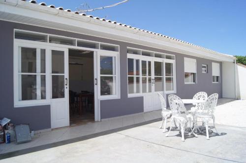 Фотография гостевого дома Casa com 2 quartos à 200 m da da praia c/ churrasqueira