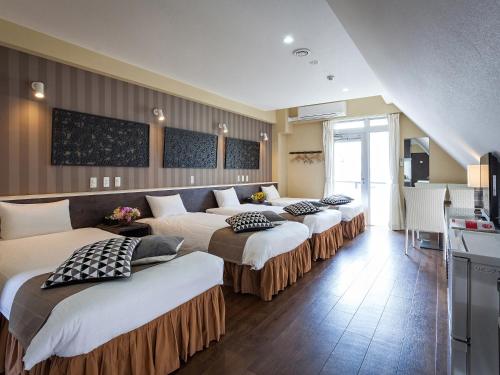 Фотография гостиницы Kariyushi Condominium Resort Naha Sky Living Hotel Asahibashi Ekimae