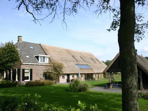 Фотография гостевого дома Grandeur Farmhouse in Dwingeloo at a National Park