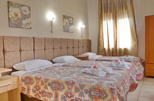 Фотография гостевого дома Pelineon Rooms