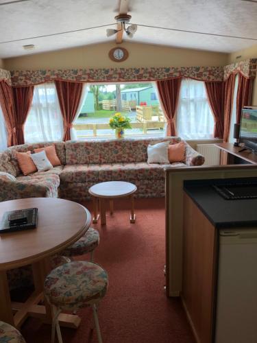 Фотография базы отдыха 62 Glenfinart Caravan Park