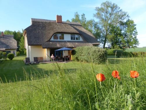 Фотография гостевого дома Behagliches Reetdachhaus Eibe 1